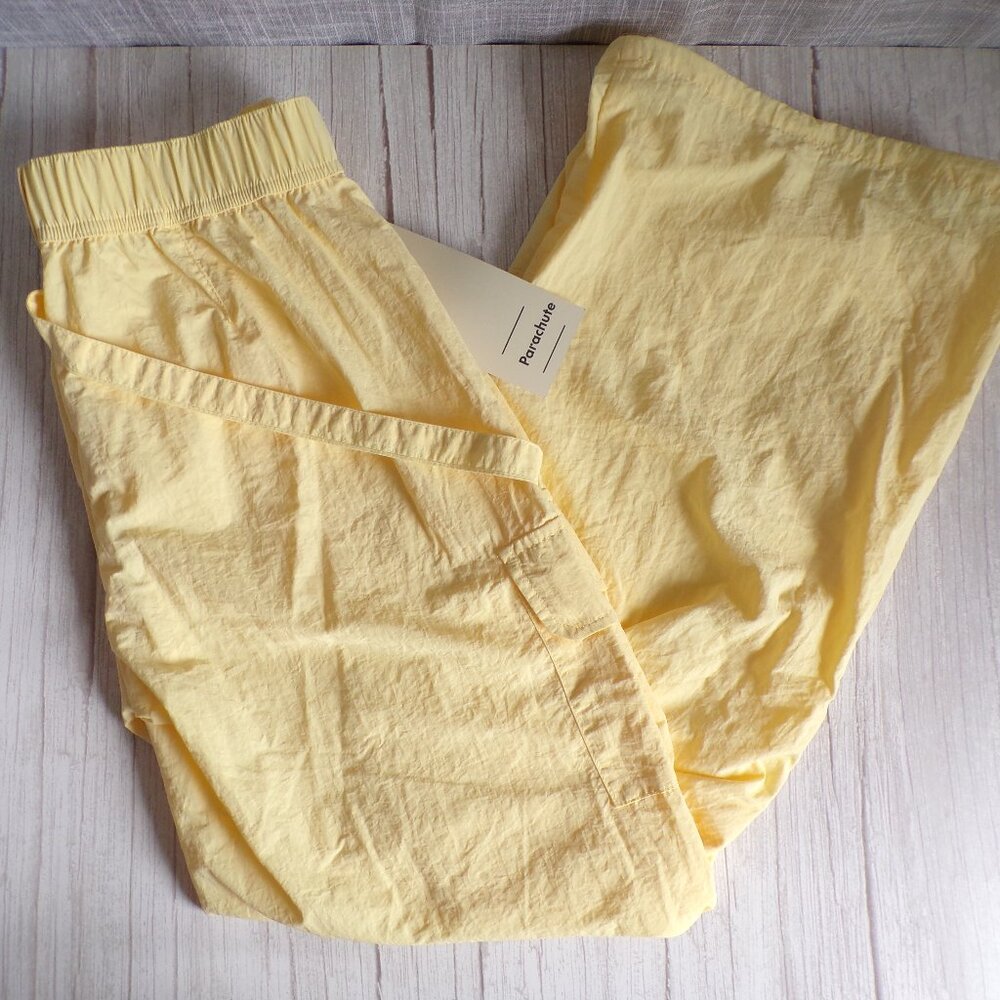 Juniors' No Boundaries Nylon Parachute Pants in Tender Lemon or Black Soot